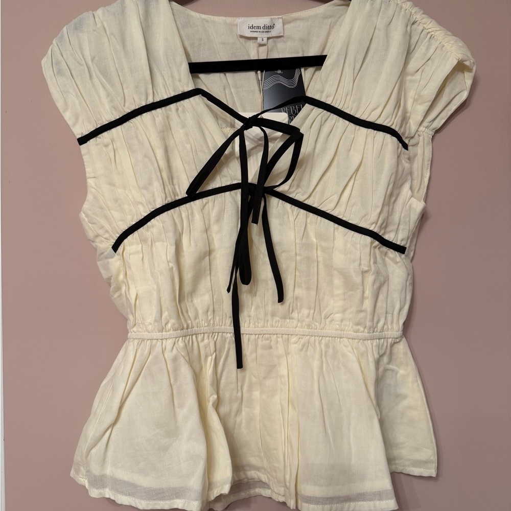 Elegant Cream Peplum Top with Ties